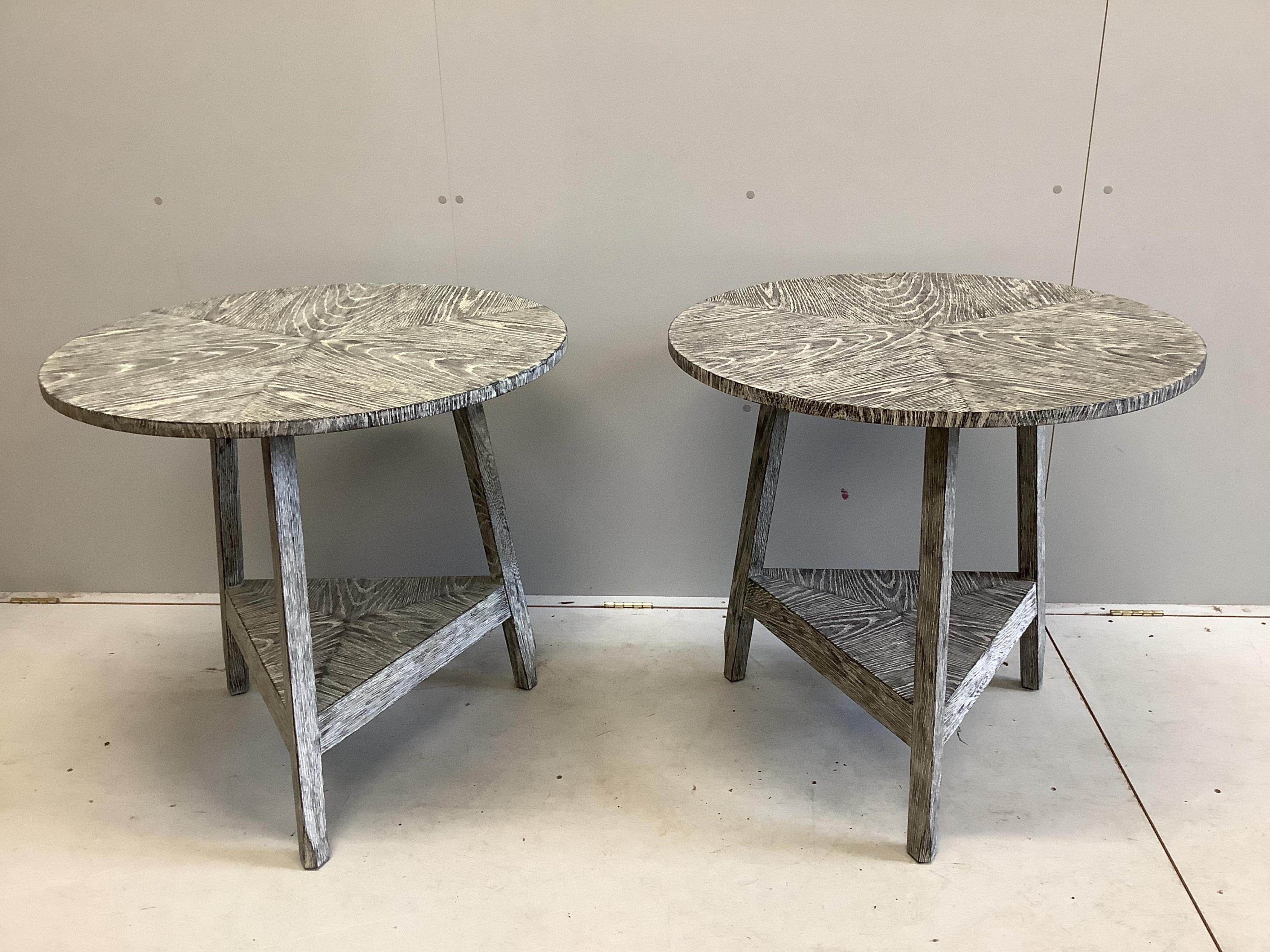 A pair of Julian Chichester bleached oak circular cricket tables, diameter 80cm, height 76cm. Condition - good